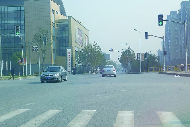 调整绿信比 过街不被截 宝山交警听取微博网