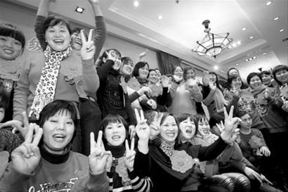 名留沪保姆喜迎龙年 今年5000名家政服务员将