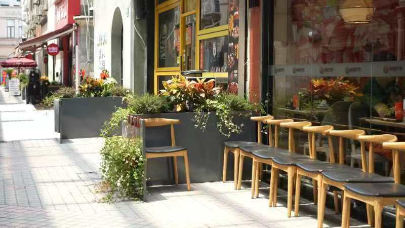 梅花路街事会给“美食街”带来可喜的变化。 资料图片.jpg 梅花路街事会给“美食街”带来可喜的变化。 资料图片.jpg